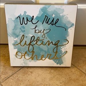 Wall art We Rise By Lifting Each Other